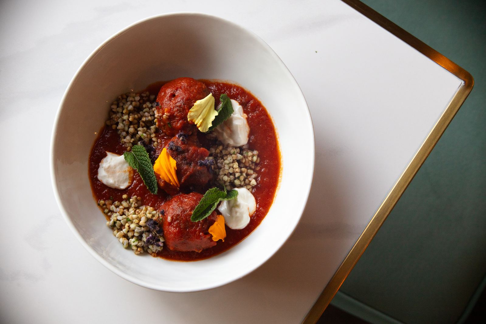 Maverick's Meatballs — hand-rolled beef and pork meatballs in marinara at Solera