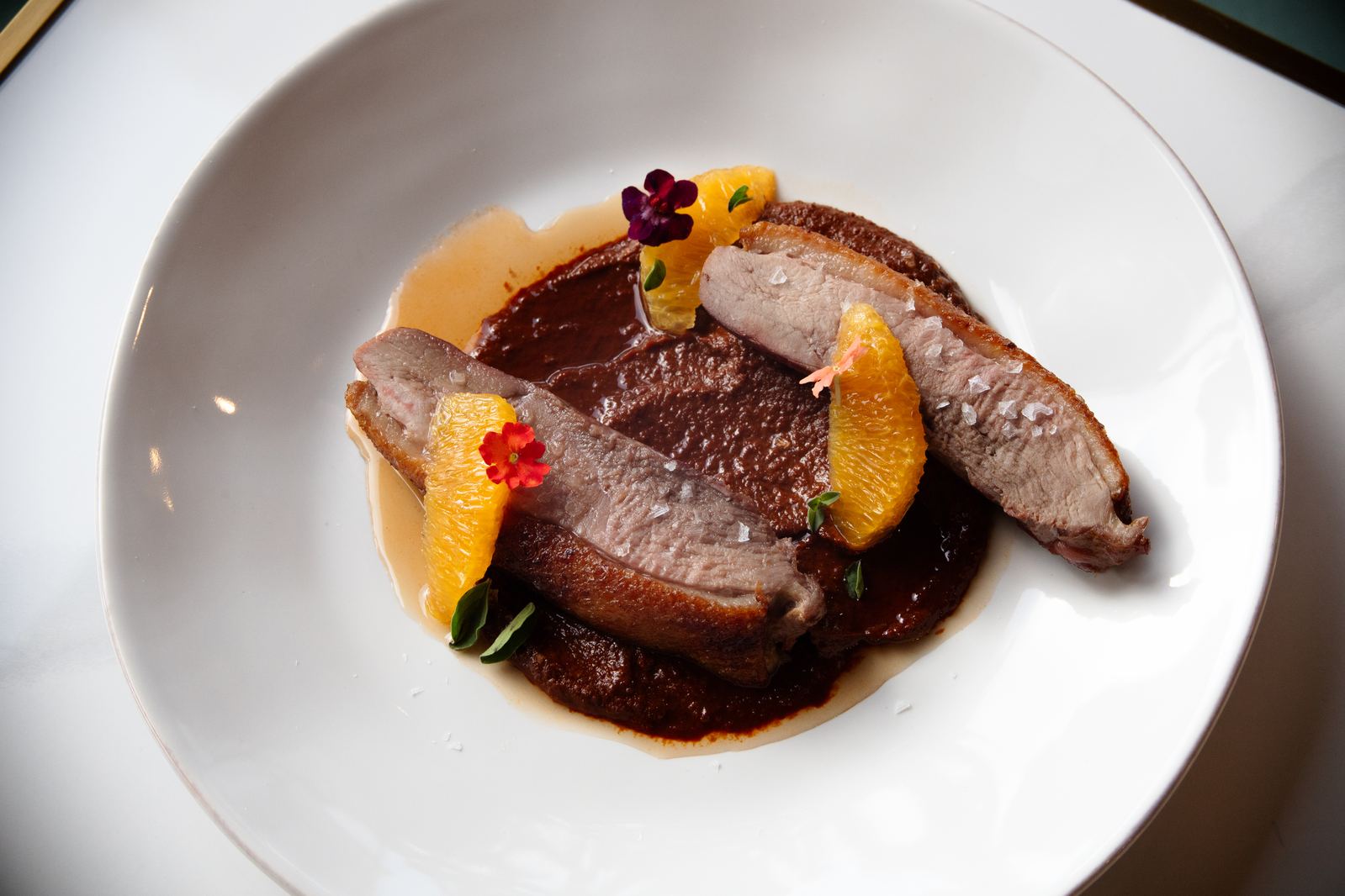 The Wohrman Duck Reserve — slow-roasted duck breast with isabella mole at Solera